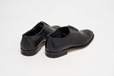 Black leather oxford shoes